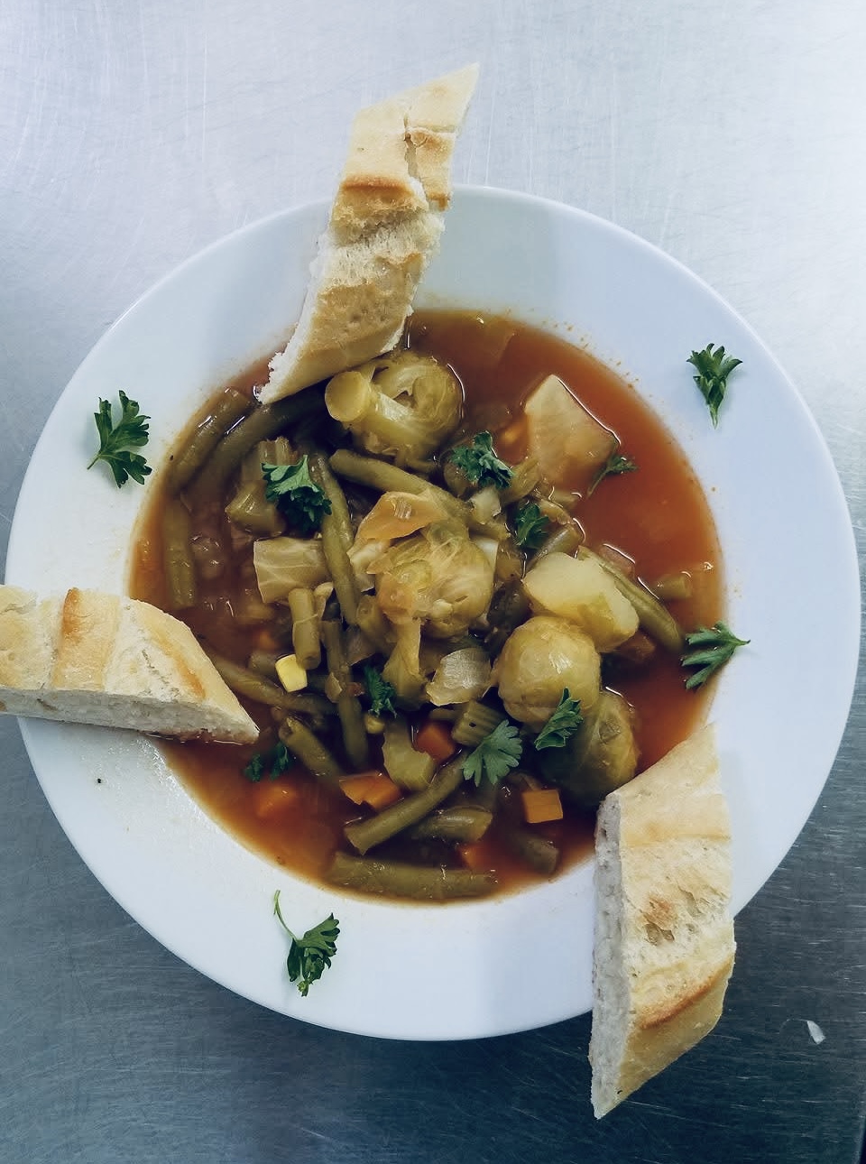 Homemade vegetable soup with crusty bread